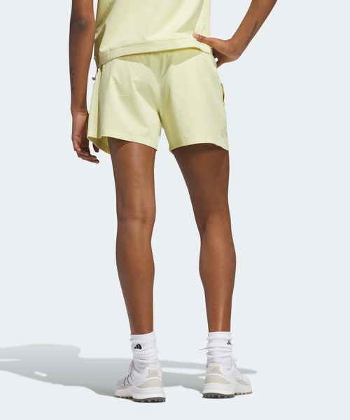 adidas(アディダス)の「ビヨンド ザ コース 撥水プリーツ ショートパンツ【adidas Golf/アディダスゴルフ】(その他パンツ・レディース・ライトイエロー・SMALL/MEDIUM/LARGE/X-LARGE/XX-LARGE)」の3枚目の写真
