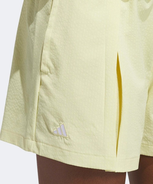 adidas(アディダス)の「ビヨンド ザ コース 撥水プリーツ ショートパンツ【adidas Golf/アディダスゴルフ】(その他パンツ・レディース・ライトイエロー・SMALL/MEDIUM/LARGE/X-LARGE/XX-LARGE)」の4枚目の写真