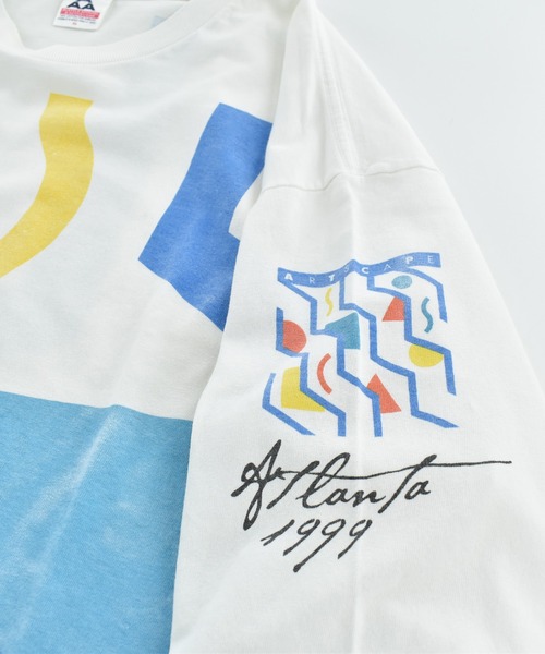 ALSTYLE APPAREL&ACTIVEWEAR(アルスタイルアパレルアンドアクティブウェアー)の「【USED】90's ALSTYLE APPARAL & ACTIVEWEAR “ARTSCAPE ATLANTA 1999” アート ロングスリーブTシャツ(Tシャツ/カットソー・メンズ・ホワイト・X-LARGE)」の2枚目の写真