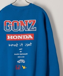 （What it isNt）ART BY MARKGONZALES（ワットイットイズント）の「【(What it isNt) ART BY MARK GONZALES/ワットイズイズント マークゴンザレス】HONDAコラボスウェット/バックデザイン/ビッグシルエット/裏起毛（スウェット・メンズ）」