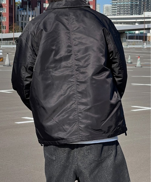 kutir(クティール)の「サークルロゴナイロンコーチジャケット(ブルゾン・メンズ・グレー/カーキ/ブラック・MEDIUM/LARGE)」の6枚目の写真