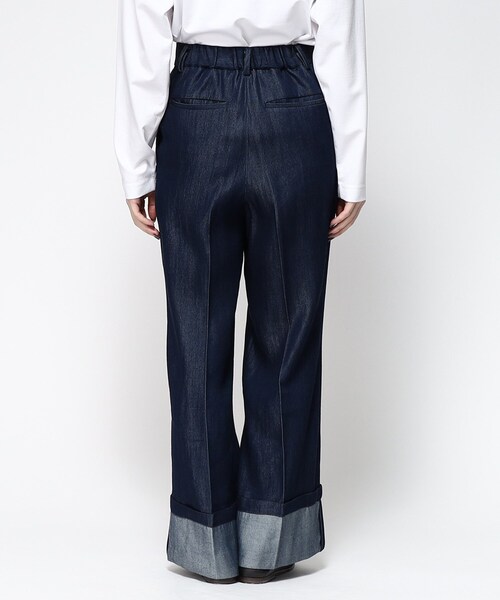 tk.TAKEO KIKUCHI（ティーケータケオキクチ）の「ブライトデニムロールアップパンツ（デニムパンツ・レディース・ネイビー系3・66）」の2枚目の写真