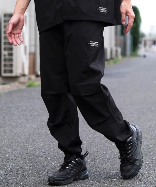 ムラサキスポーツ(ムラサキスポーツ)の「【ムラサキスポーツ限定】DEAR LAUREL/ディアローレル ダブルプリーツイージーパンツ ジョガータイプ ストレッチ/吸汗速乾 セットアップ対応 D24S3104(その他パンツ・メンズ・ブラック/グレー/グレイッシュベージュ・L/XL/M)」の5枚目の写真