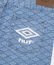 HUF（ハフ）の「UMBRO BRANED ETCHING DENIM / HUF ハフ デニムパンツ