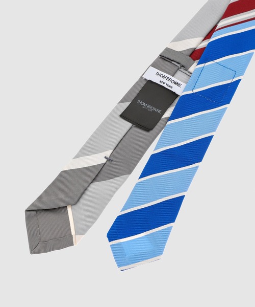 THOM BROWNE(トムブラウン)の「THREE PANEL FUNMIX CLASSIC TIE IN WIDE REP STRIPE SILK COTTON MOGADOR MED GREY(ネクタイ・メンズ・グレー系その他/その他・ONE SIZE)」の4枚目の写真