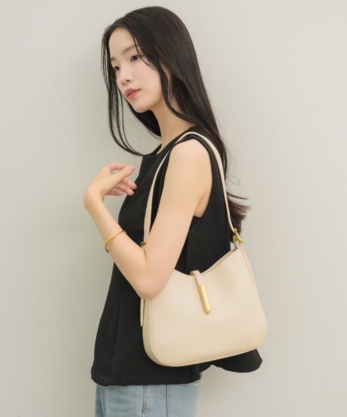 NEUNA(ヌナ)の「【大人気bagからminiサイズが登場!】miniラウンドトートバッグ(ショルダーバッグ・レディース・アイボリー/ブラック・FREE)」の13枚目の写真