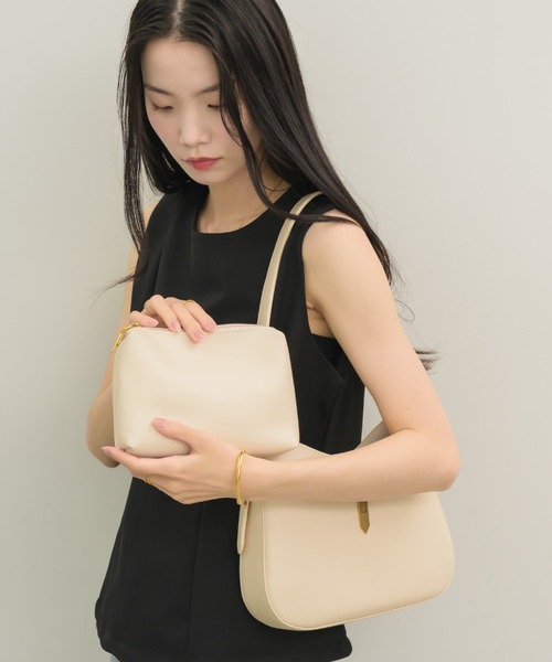 NEUNA(ヌナ)の「【大人気bagからminiサイズが登場!】miniラウンドトートバッグ(ショルダーバッグ・レディース・アイボリー/ブラック・FREE)」の21枚目の写真