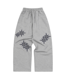 S'EST（エスイーエスティー）の「Twin Star Applique Training Pants Gray（スウェットパンツ）」