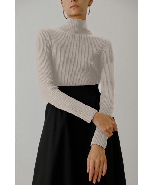 RIM.ARK（リムアーク）の「Metal button high neck tops（ニット