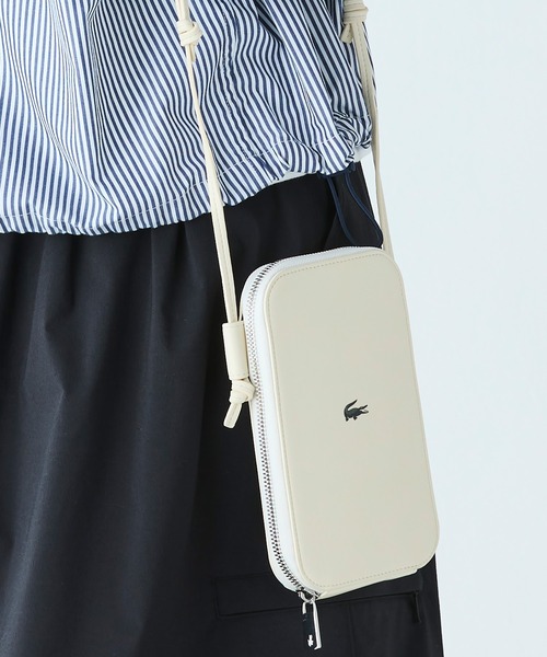 LACOSTE（ラコステ）の「ワンポイントワニロゴスマホポーチ Size: 11.5 x 18.5 x 2cm（スマホグッズ・レディース・アイボリー/ブラック/イエロー/グリーン・FREE）」の5枚目の写真