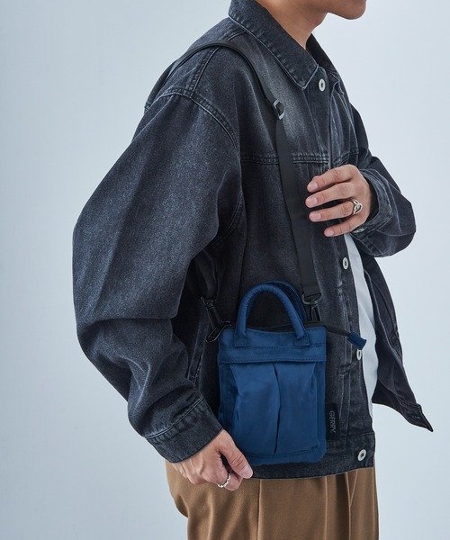 GERRY(ジェリー)の「【GERRY】GERRYヘルメットバッグミニ YMY(ハンドバッグ・メンズ・ダークグリーン/ブラック/ネイビー/チャコールグレー・FREE)」の1枚目の写真