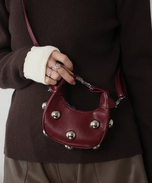 Ulysses（ユリシス）の「スタッズハーフムーンマイクロバッグ（ハンドバッグ）」