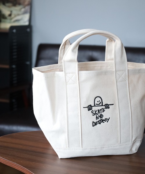 THRASHER(スラッシャー)の「THRASHER LUNCH TOTEBAG ランチトートバッグ(ハンドバッグ・メンズ・ホワイト系/ホワイト×ブラック・FREE)」の1枚目の写真