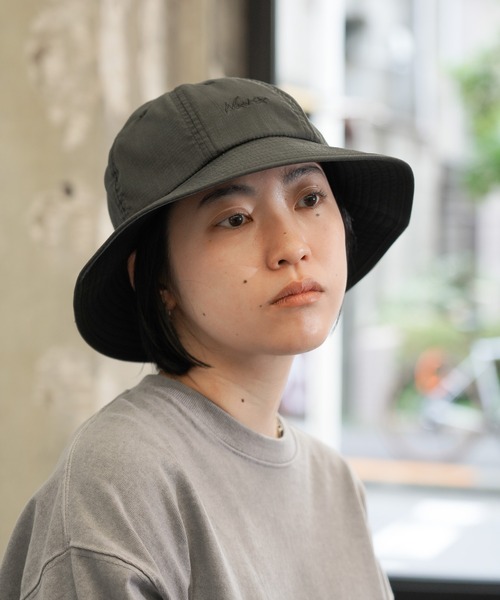 NANGA(ナンガ)の「NANGA / ナンガ HINOC RIPSTOP UT 7PANEL HAT ヒノック リップストップ 7パネル ハット(ハット・メンズ・ブラック/エメラルド・FREE)」の1枚目の写真
