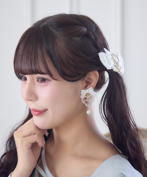 ROJITA(ロジータ)の「リボン付ダブルハートイヤリング(イヤリング・レディース・ピンク・FREE)」の9枚目の写真