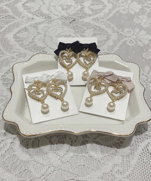 ROJITA(ロジータ)の「リボン付ダブルハートイヤリング(イヤリング・レディース・ピンク・FREE)」の13枚目の写真