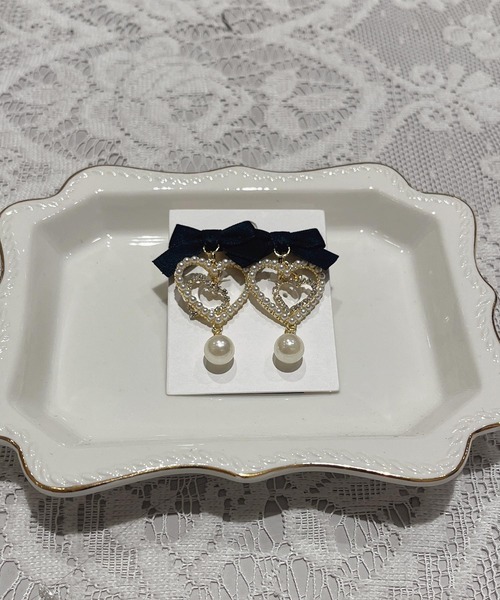 ROJITA(ロジータ)の「リボン付ダブルハートイヤリング(イヤリング・レディース・ピンク・FREE)」の11枚目の写真