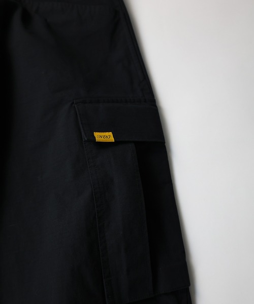 NUMBER (N)INE(ナンバーナイン)の「WIDE-LEG COTTON-NYLON RIPSTOP CARGO TROUSERS / リップストップ ワイドカーゴパンツ(カーゴパンツ・メンズ・ブラック/オリーブ・2/4/3)」の19枚目の写真