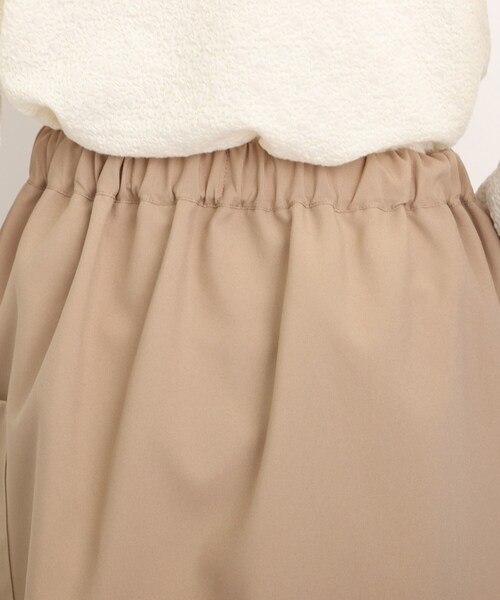 DRESKIP（ドレスキップ）の「◆【幅広いコーデに着回せる！】ラップ風ポケ付ナロ－スカート（スカート・レディース・ブラック/オレンジ/ベージュ・02/03/04）」の4枚目の写真