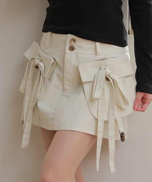 M DOLLY(エムドリー)の「ribbon pocket tempo mini skirt/リボンポケットテンポミニスカート(スカート・レディース・アイボリー/ブラック・S/M)」の1枚目の写真