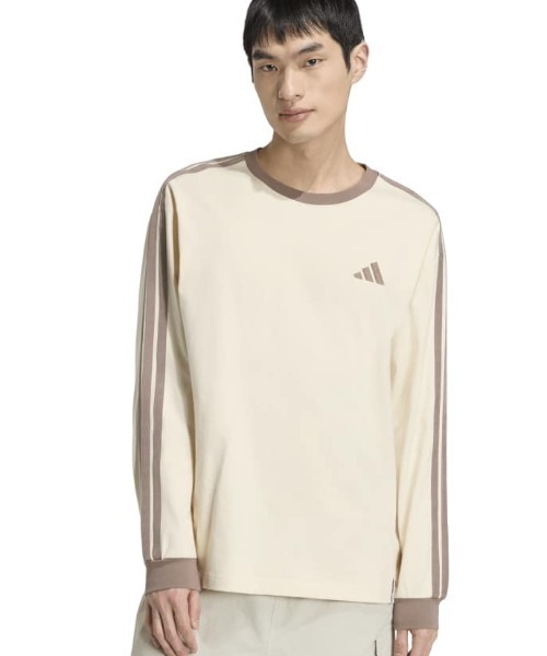 adidas(アディダス)の「アディダス adidas エッセンシャル プラス ルーズフィット スリーストライプス シングルジャージー 長袖Tシャツ(Tシャツ/カットソー・メンズ・サックスブルー/アイボリー・LL/S/M/L/3L)」の2枚目の写真