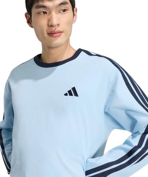 adidas(アディダス)の「アディダス adidas エッセンシャル プラス ルーズフィット スリーストライプス シングルジャージー 長袖Tシャツ(Tシャツ/カットソー・メンズ・サックスブルー/アイボリー・LL/S/M/L/3L)」の5枚目の写真