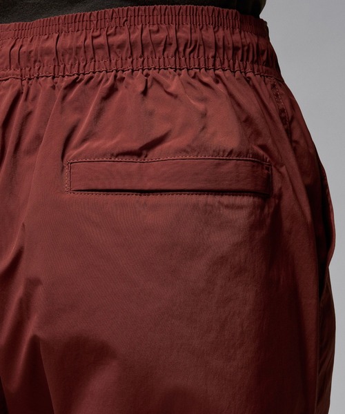 JORDAN BRAND(ジョーダンブランド)の「JORDAN BRAND ESS STMT WOVEN PANT FV7306(その他パンツ・メンズ・ブラウン/ブラック・M/L/XL)」の3枚目の写真