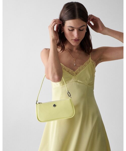 Kate Spade New York イエローポーチ kate spade new york（ケイトスペード ニューヨーク）の「ケイラ