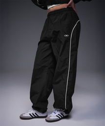 BORN TO WIN（ボーントゥウィン）の「W PIPING LINE WIND SHELL PANTS [BLACK]（スウェットパンツ）」