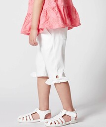BeBe（ベベ）の「裾リボンモチーフツイルカプリパンツ(90~150cm)（その他パンツ）」