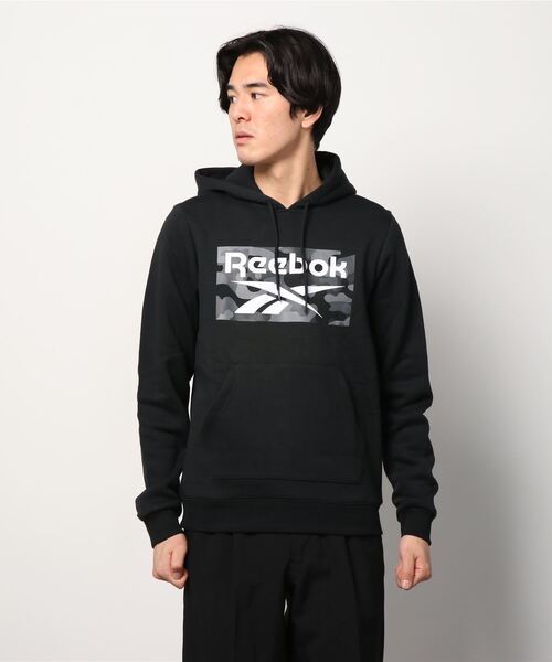 Reebok(リーボック)の「カモ オールオーバー プリント プルオーバー フーディー / Camo Allover Print Pullover Hoodie(パーカー・メンズ・ブラック・SMALL/MEDIUM/LARGE/X-LARGE/XX-LARGE/X-SMALL/XXX-LARGE)」の2枚目の写真