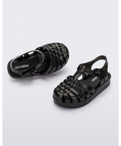 melissa(メリッサ)の「MINI MELISSA POSSESSION SHINY BB(サンダル・キッズ・クリアブラック/ピンク/クリア/ブルー・27/22-23/25-26/24)」の1枚目の写真