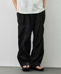 【and wander/アンドワンダー】crinkled nylon pants
