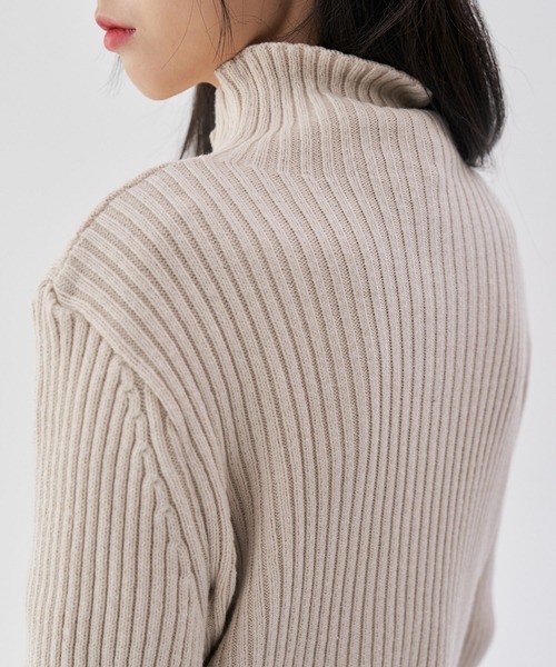 FEKETE（フェケテ）の「FEKETE HI-NECK RIB KNIT CARDIGAN