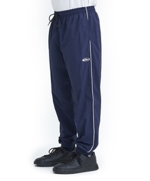 ST WATER REPELLENT P/クイックシルバーライン入りワンポイントブランドロゴナイロントラックパンツ