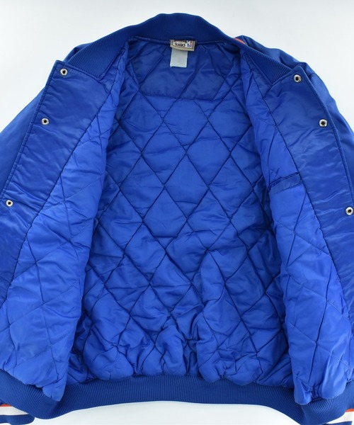 NBA/NFL/NHL/MLB(エヌビーエーエヌエフエルエヌエイチエルエムエルビー)の「【USED】90’s HARDWOOD CLASSICS “NBA New York Knicks” ナイロン アワードジャケット(スタジャン・メンズ・ブルー・XXX-LARGE)」の9枚目の写真