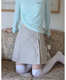 Smyeon�i�X�~�����j�́uAsymmetrical button pleated skirt/�A�V�����g���[�{�^���v���[�c�X�J�[�g�i�X�J�[�g�j�v
