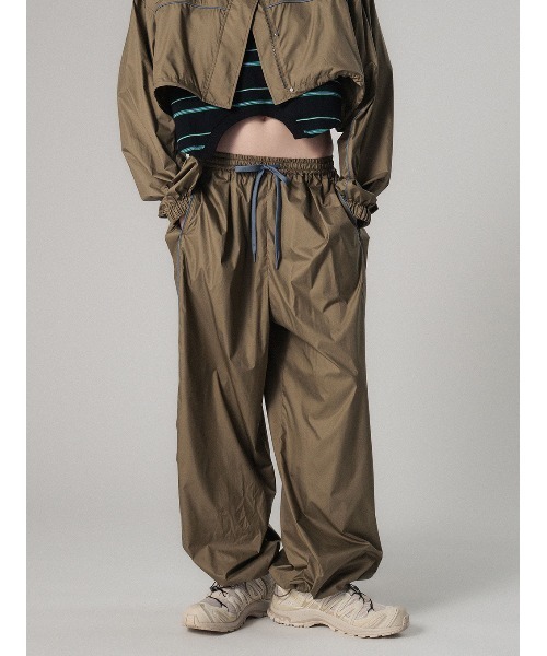 ELCHELE（エルチェレ）の「UNIVERSAL WINDBREAKER PANTS（その他パンツ・レディース・カーキ/ブラック・38/36）」の8枚目の写真