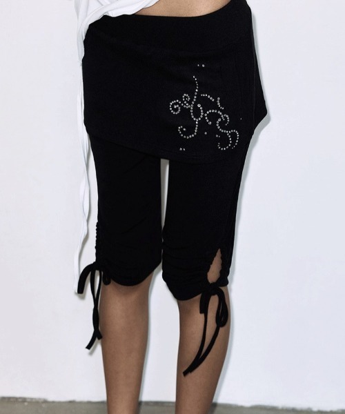 FANCY CLUB(ファンシークラブ)の「A'GEM/9 × .kom 『FANCY CLUB/ファンシークラブ』HOTFIX SHIRRING SKIRT LEGGINGS/ホットフィックスシャーリングスカートレギンス(スカート・レディース・ブラック・FREE)」の1枚目の写真
