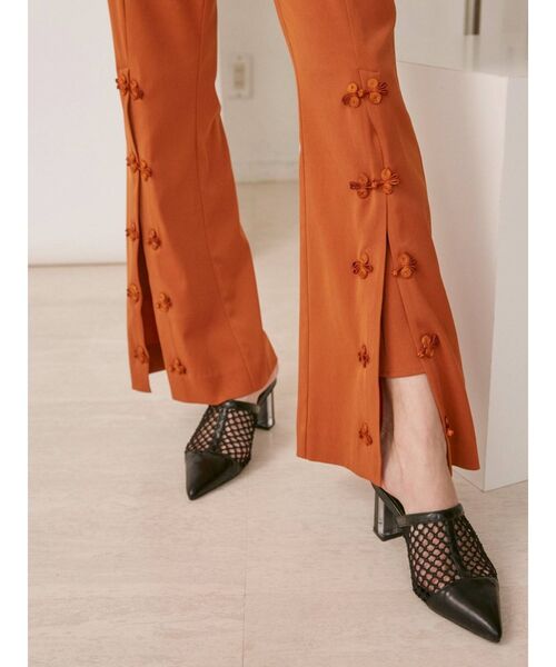 EVRIS（エヴリス）の「フロントボタンフレアパンツ（その他パンツ・レディース・オレンジ/ブラック/ミント・MEDIUM/SMALL）」の4枚目の写真