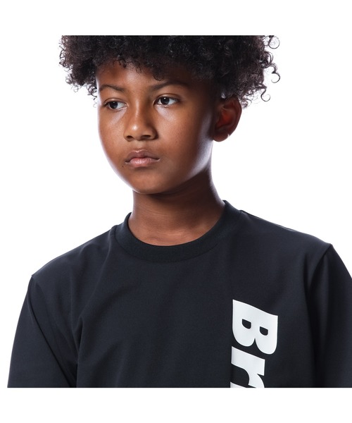 F.C.Real Bristol（エフシーレアルブリストル）の「AUTHENTIC VERTICAL LOGO TEE（Tシャツ/カットソー・キッズ・ホワイト/ベージュ/ブラック・MEDIUM/LARGE/SMALL）」の7枚目の写真