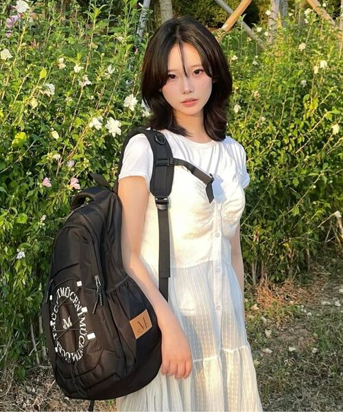 MUCENT（ムセント）の「トレバン 円形ロゴバックパック (成人男女共用)（バックパック/リュック・レディース・ブラック・FREE）」の12枚目の写真