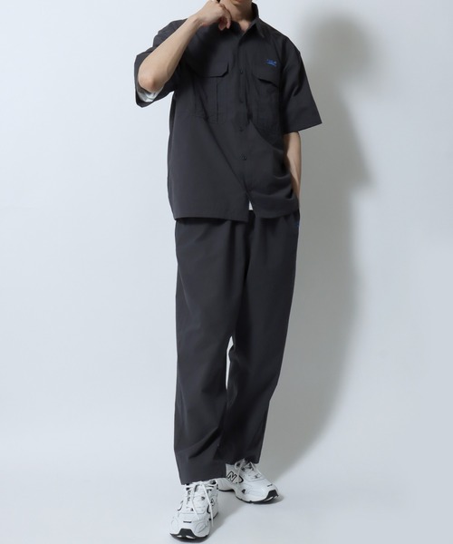CONVERSE(コンバース)の「CONVERSE Jack Purcell/コンバース ジャックパーセル オーバーサイズ シアサッカー ユニセックス 半袖シャツ セットアップ対応(シャツ/ブラウス・メンズ・チャコール/ネイビー・S/M/L)」の22枚目の写真
