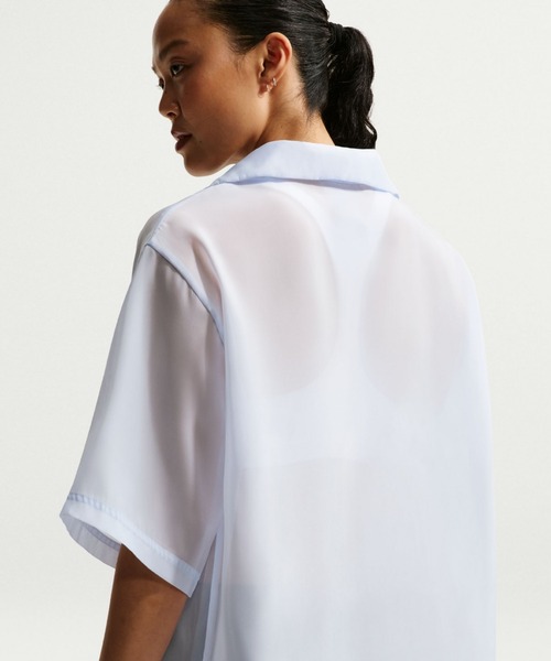 NIKE(ナイキ)の「ナイキ スポーツウェア ウィメンズ オーバーサイズド シアー トップス / Nike Sportswear Women's Oversized Sheer Top IR1681-407 Hydrogen Blue(ポロシャツ・レディース・クリアブルー・XS/XL/S/M/L/2XL)」の2枚目の写真