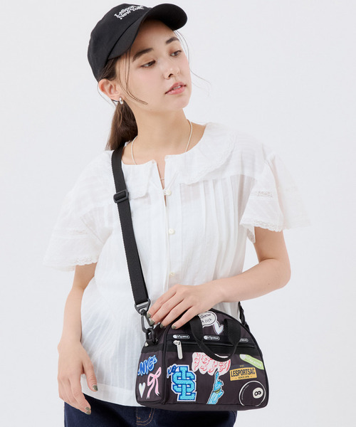 LeSportsac(レスポートサック)の「PW ROUND SM SATCHEL パッチワークブラックラウンドSMサッチェル(ショルダーバッグ・レディース・ブラック・FREE)」の1枚目の写真