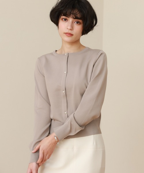 TRUDEA(トルディア)の「スポンディッシュ パールボタンカーディガン(カーディガン/ボレロ・レディース・ピンクベージュ/ネイビー/ホワイト・MEDIUM/LARGE)」の1枚目の写真