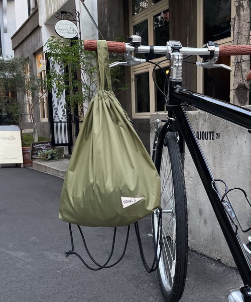 CANAL JEAN（キャナルジーン）の「1975 TOKYO　BOWLSナップサック（バックパック/リュック・レディース・ブラック/カーキ/ネイビー・ONE SIZE）」の6枚目の写真