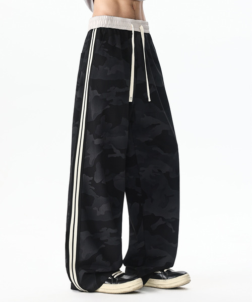 neos（ネオス）の「【neos】カモフラ柄 シャカシャカ サイドライン トラックパンツ ワイドパンツ メンズ レディース ルーズシルエット イージーパンツ ユニセックス（スウェットパンツ・メンズ・ホワイト/ブラック・MEDIUM/LARGE/X-LARGE）」の5枚目の写真