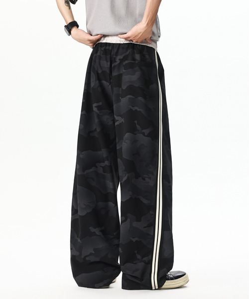 neos（ネオス）の「【neos】カモフラ柄 シャカシャカ サイドライン トラックパンツ ワイドパンツ メンズ レディース ルーズシルエット イージーパンツ ユニセックス（スウェットパンツ・メンズ・ホワイト/ブラック・MEDIUM/LARGE/X-LARGE）」の6枚目の写真