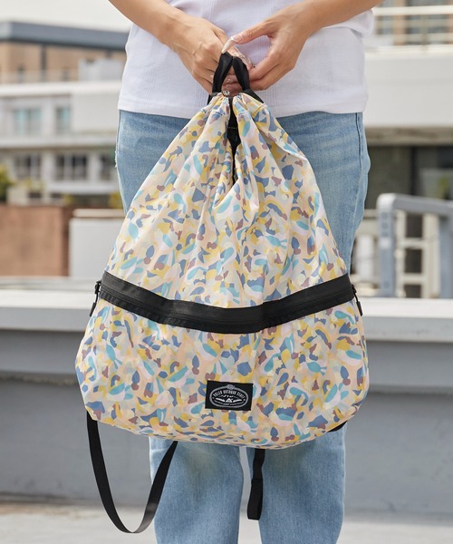 POLeR(ポーラー)の「POLeR/ポーラー LIGHT STUFF KNAPSACK リップストップナイロン ブランドタグ ナップサック ポケッタブル デイリー ジム メンズ 2026年夏 夏服(バックパック/リュック・メンズ・ブラック/パープル/イエロー/マルチ・FREE)」の1枚目の写真